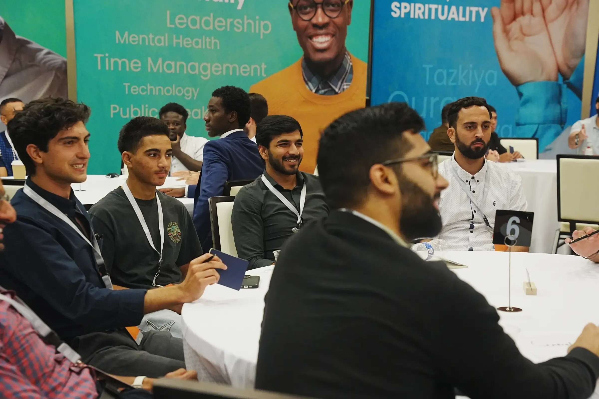 Attendees at a workshop table during the 2025 Lighthouse Conference